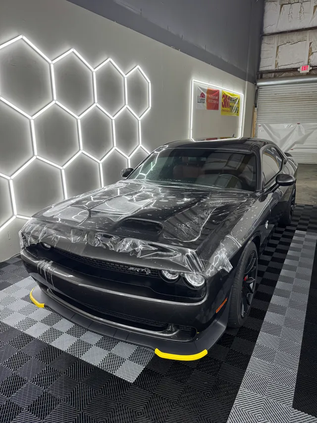 Dodge Challenger SRT having paint protection film fitted to the hood and fenders in Alpharetta, GA